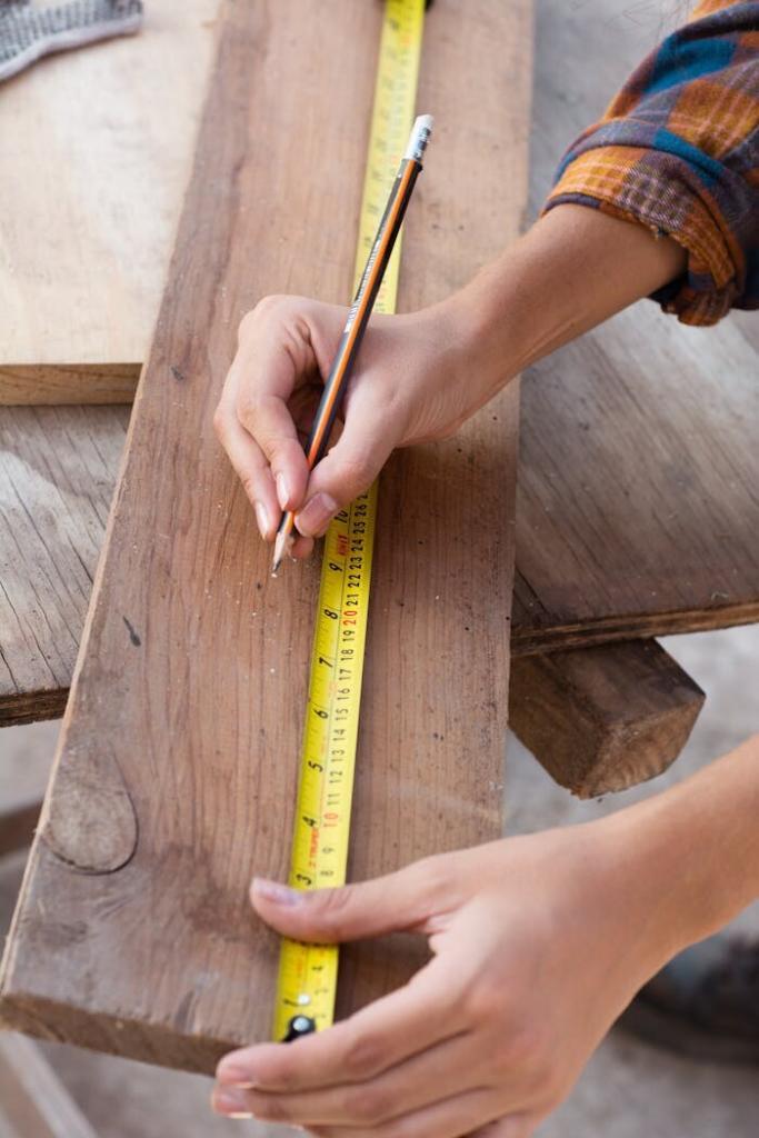 Contractor marking framing wood with a pencil and ruler—precision measuring by licensed framing and drywall contractors near San Jose.